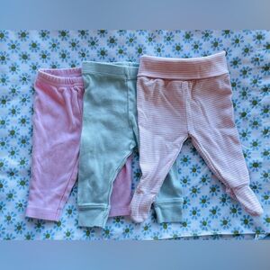 Lot of three baby girl pants from three different brands. 0-3 months